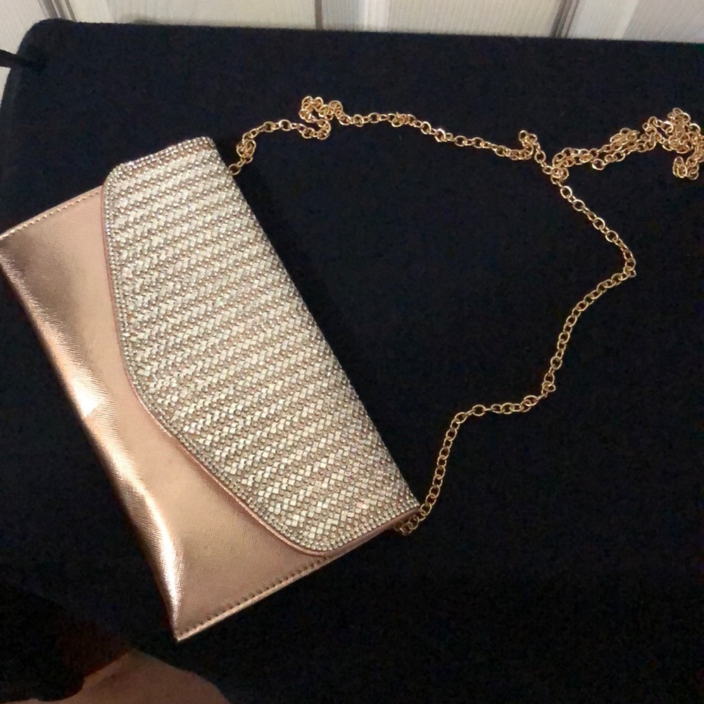 Cross gold clutch